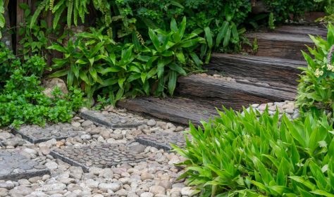 stone walk way and wood stairs in the garden